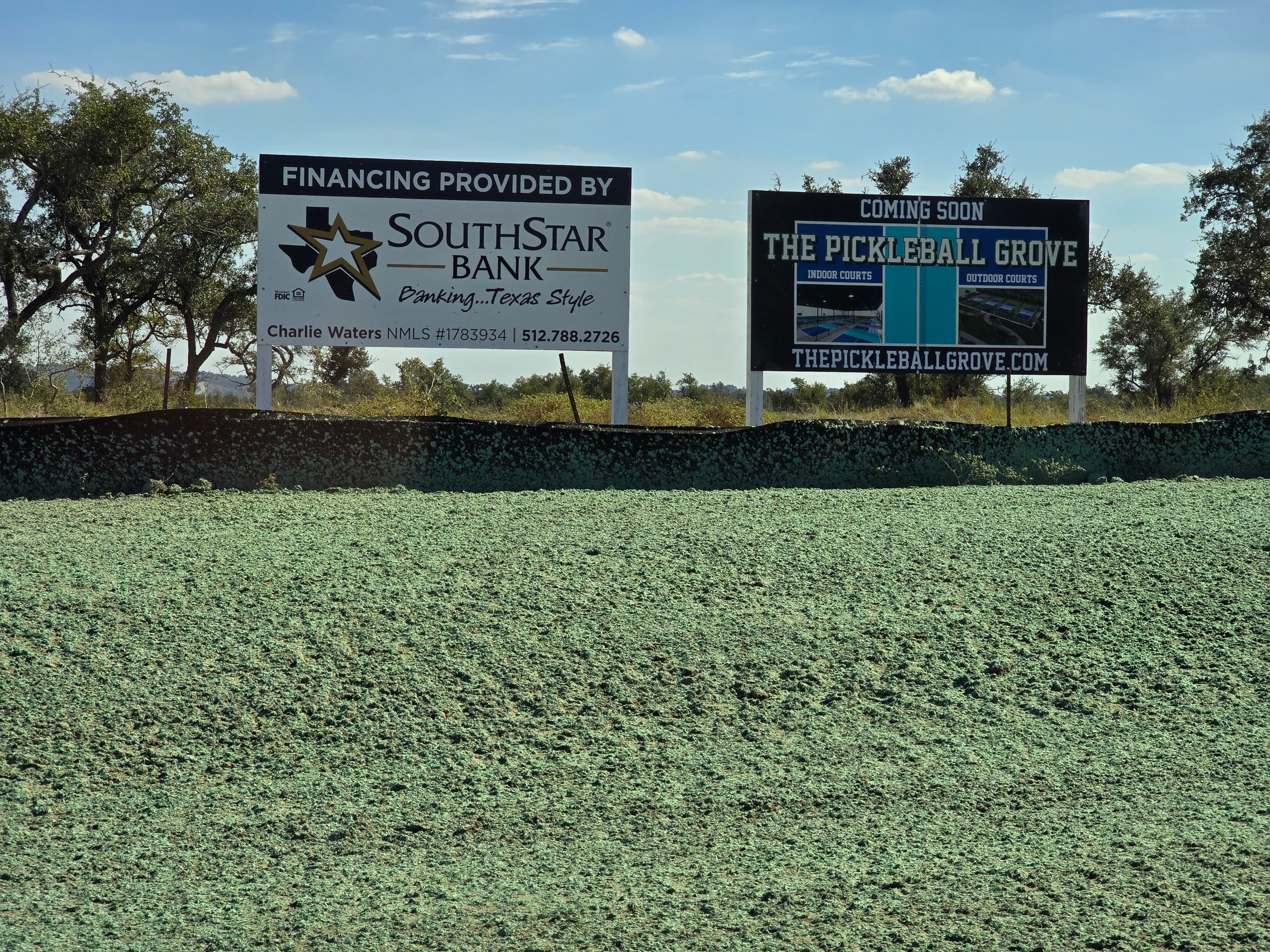 Construction site signage — SouthStar Bank financing and The Pickleball Grove coming soon